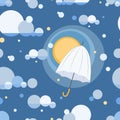 Cloudy sky, umbrella, blue background. Royalty Free Stock Photo